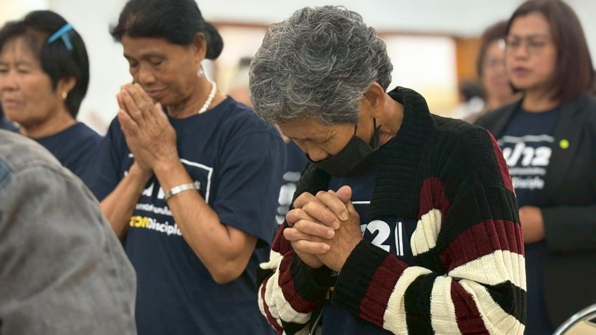 Believers praying together
